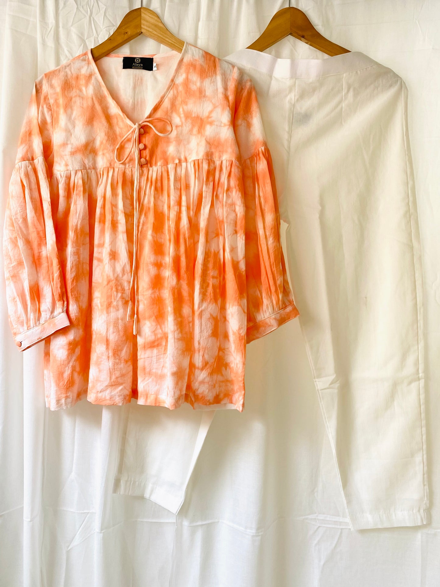 Mud Peach Tie Dye Top with solid White Pants