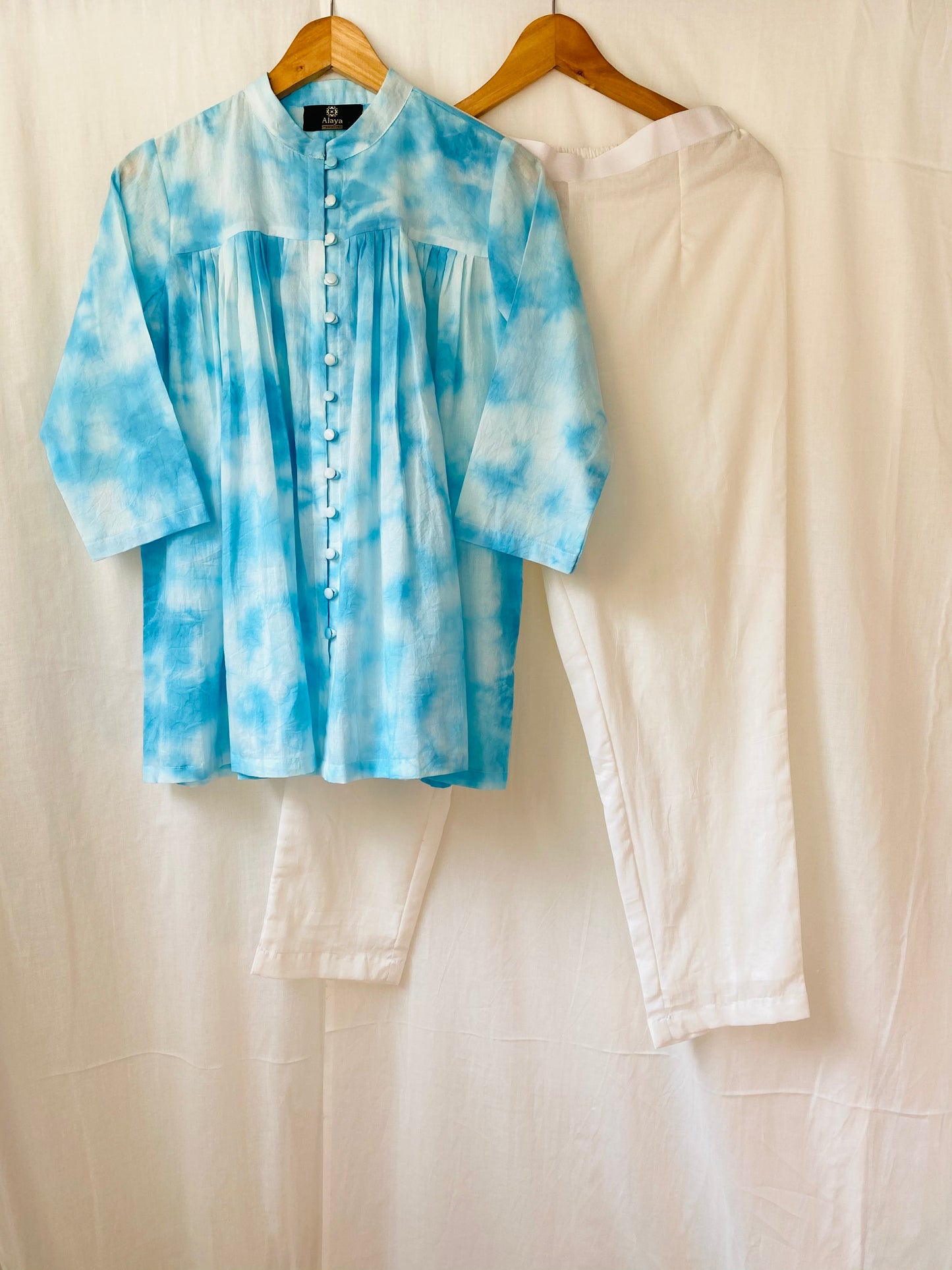 Blue Tie Dye Top with solid White Pants